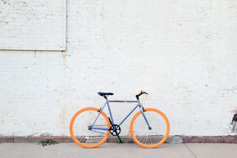 Close up of bicycle wheel on road